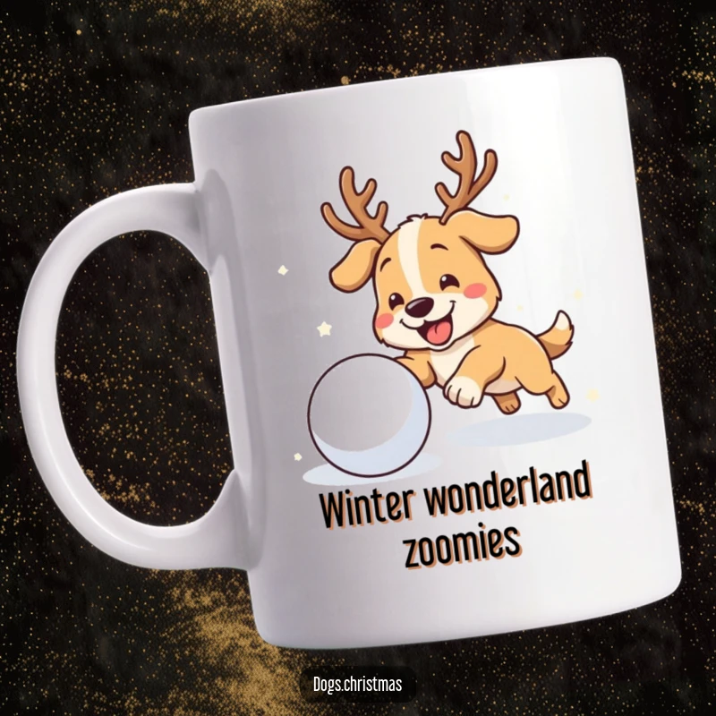 Funny antler dog mug depicting a dog wearing antlers, gleefully chasing a rolling snowball through the snow.