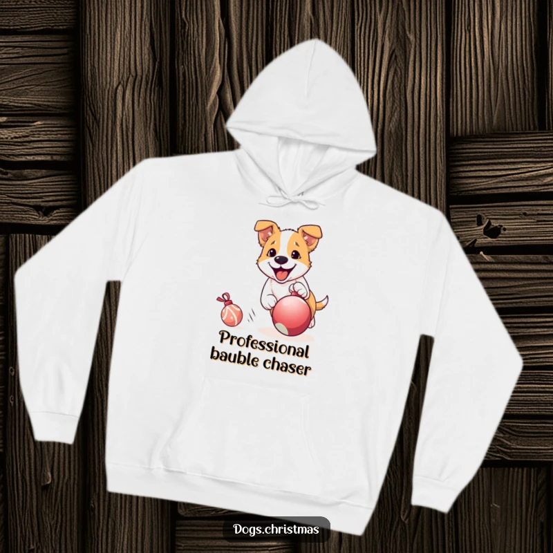 Funny Dog Hoodie: A spirited dog in full chase of a rolling Christmas ornament, depicting holiday excitement and playful, energetic chaos.