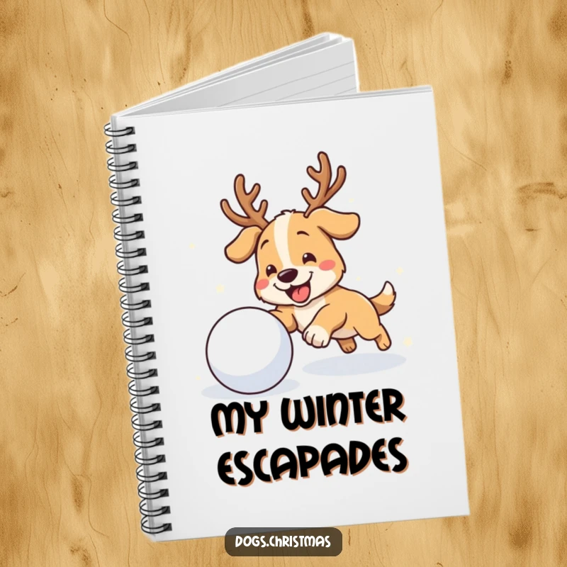 Funny antler dog notebook featuring a dog with antlers chasing a snowball, perfect for jotting down winter ideas.
