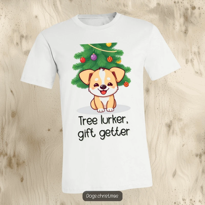 Funny Dog Christmas T-Shirt: A dog with a happy grin peeks out from under a Christmas tree, embodying holiday mischief.